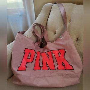 PINK weekender/gym bag. 24" wide by 17" deep in a light mauve coloe.